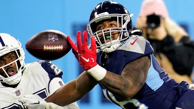Dallas Cowboys cornerback Nahshon Wright breaks up a pass intended for Tennessee Titans wide receiver Treylon Burks during the fourth quarter at Nissan Stadium on Thursday, Dec. 29, 2022, in Nashville.